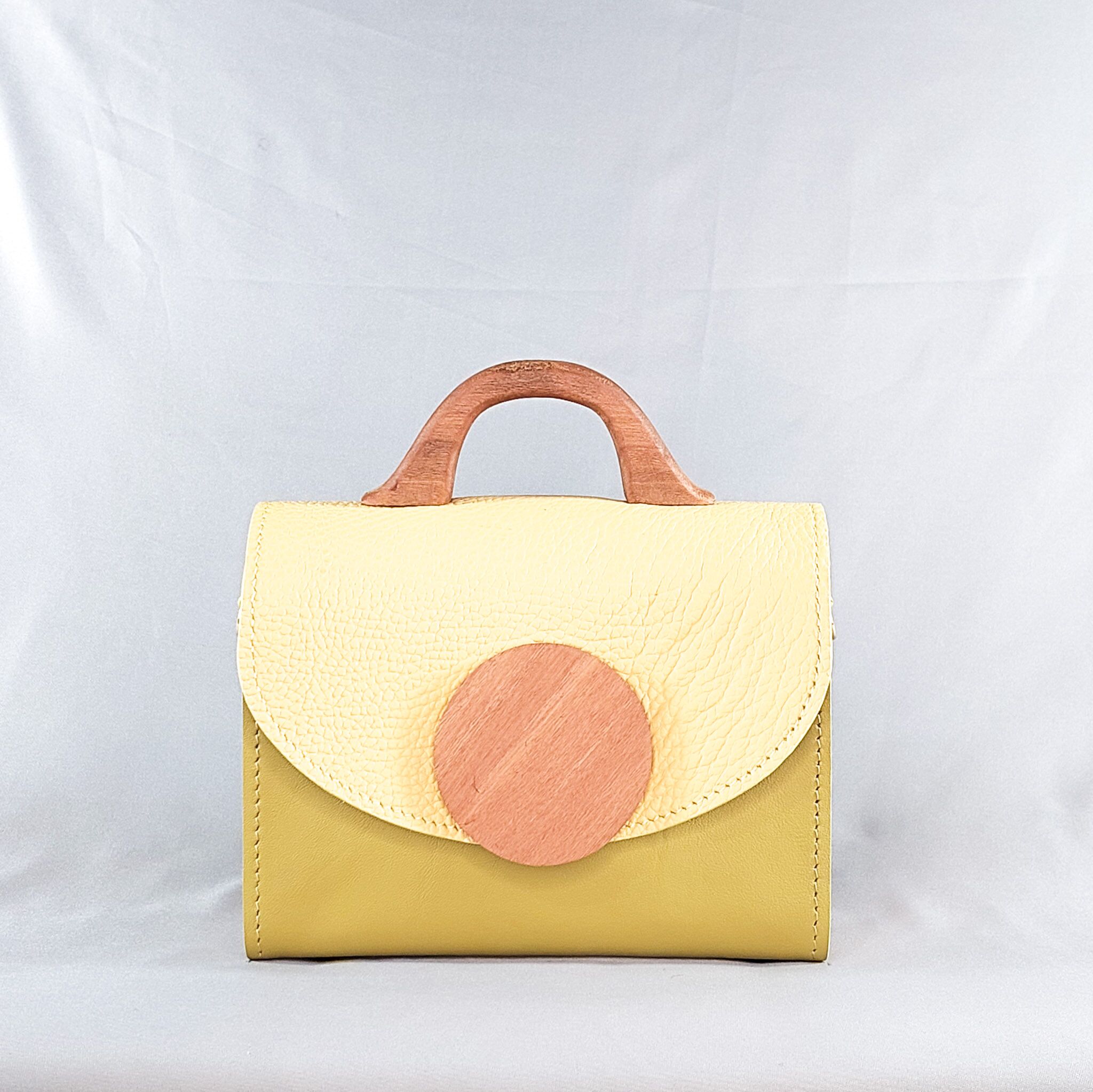 TEXTURED YELLOW AND GREEN KONAMA TOP HANDLE BAG
